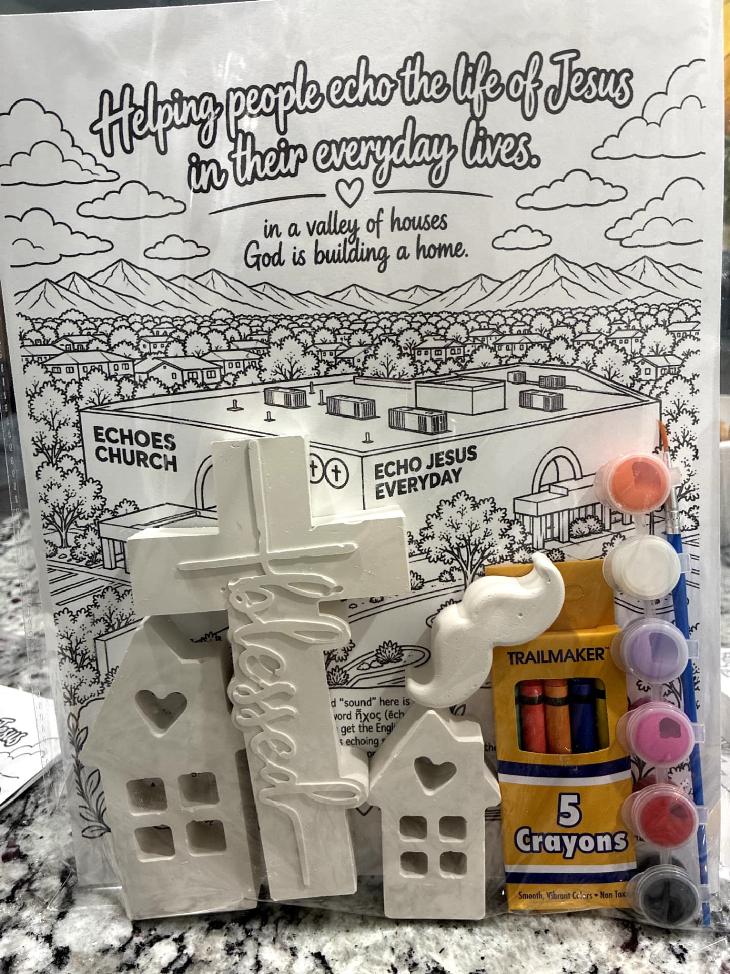 Echoes Church Building Campaign Kit with houses, blessed cross, mustache, coloring page, paints and crayons